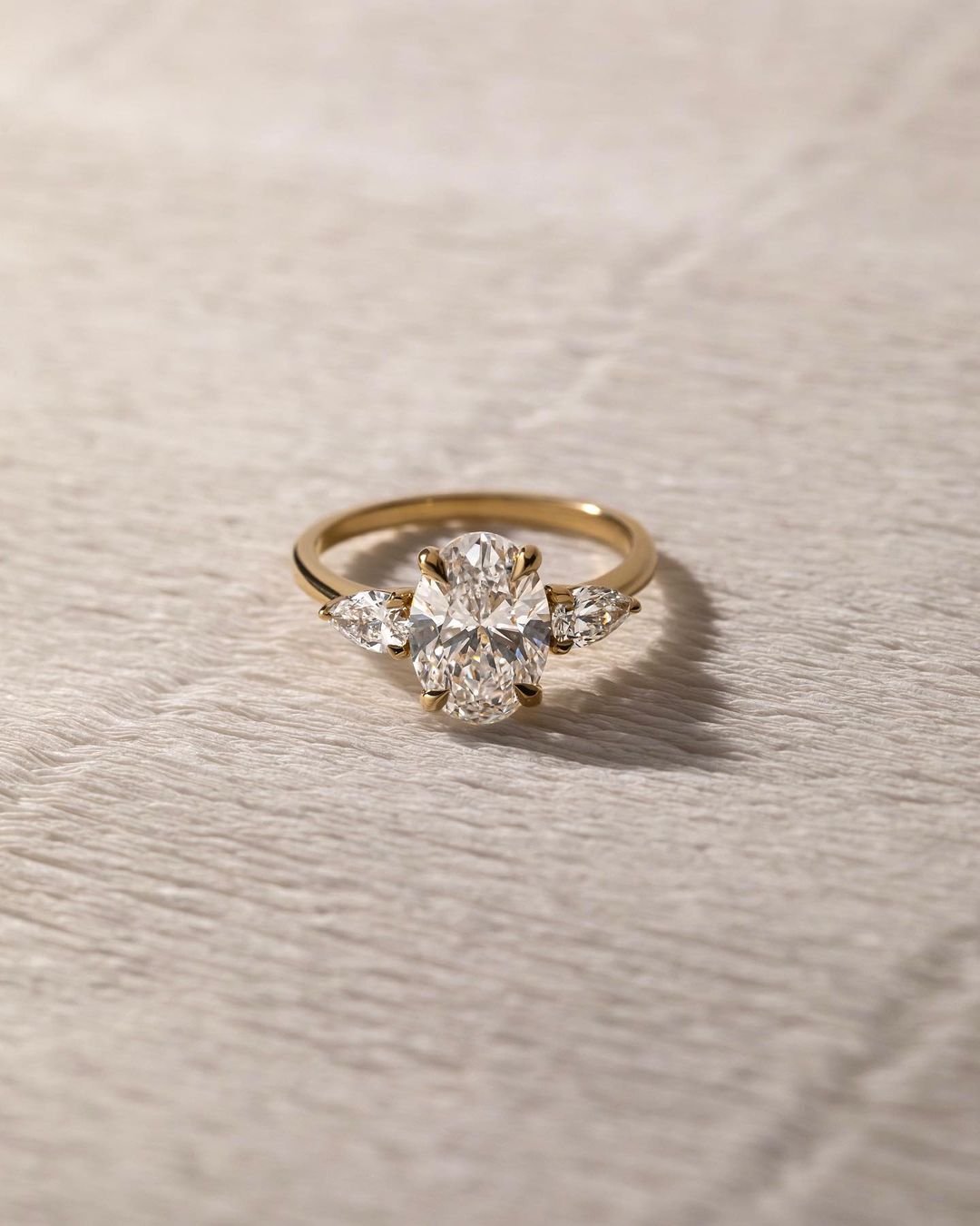 2.5ct Oval Cut Center Stone With Two side Pear Cut Luxury Diamond Ring on a Sleek Gold Band β Perfect for Engagements, Weddings, and Special Occasions YouTube Amazon Facebook Weather Google Gmail Wordless WhatsApp Web Translate News blog post ring ceremony Article Life Money 2025 design Ring Ceremony Diamond Shape Diamond Ring Surat Diamond India Market Diamond Ring for Her Diamond Ring for Men Diamond Ring Women Engagement Ring Finger For Her Finger Ring Gold Ring Bluestone Ring Diamond Ring PriceΒ GoldΒ