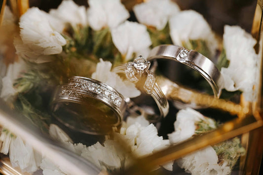 A collection of stylish rings displayed elegantly, featuring lab-grown diamonds, moissanite, and sterling silver designs from Avxy Jewels.