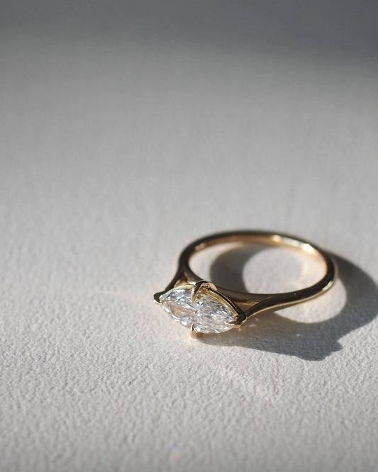 1.5ct Marquise Solitaire Lab Grown Diamond Ring diamond engagement ring with a sleek gold band, featured on a hand with a minimalist manicure. Ideal for bridal jewelry collections, luxury fashion, or romantic proposal moments. YouTube Amazon Facebook Weather Google Gmail Wordless WhatsApp Web Translate News blog post ring ceremony Article Life Money 2025 design Ring Ceremony Diamond Shape Diamond Ring Surat Diamond India Market Diamond Ring for Her Diamond Ring for Men Diamond Ring Women Engagement Ring 