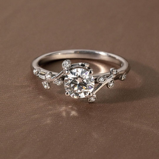 1ct Round Cut Lab Grown With Vine Band Ring Sophisticated -cut diamond ring set in a classic gold band, beautifully neutral-toned nails. A must-have for engagement proposals, high-end jewelry lovers, and wedding occasions. YouTube Amazon Facebook Weather Google Gmail Wordless WhatsApp Web Translate News blog post ring ceremony Article Life Money 2025 design Ring Ceremony Diamond Shape Diamond Ring Surat Diamond India Market Diamond Ring for Her Diamond Ring for Men Diamond Ring Women Engagement Ring Finger 