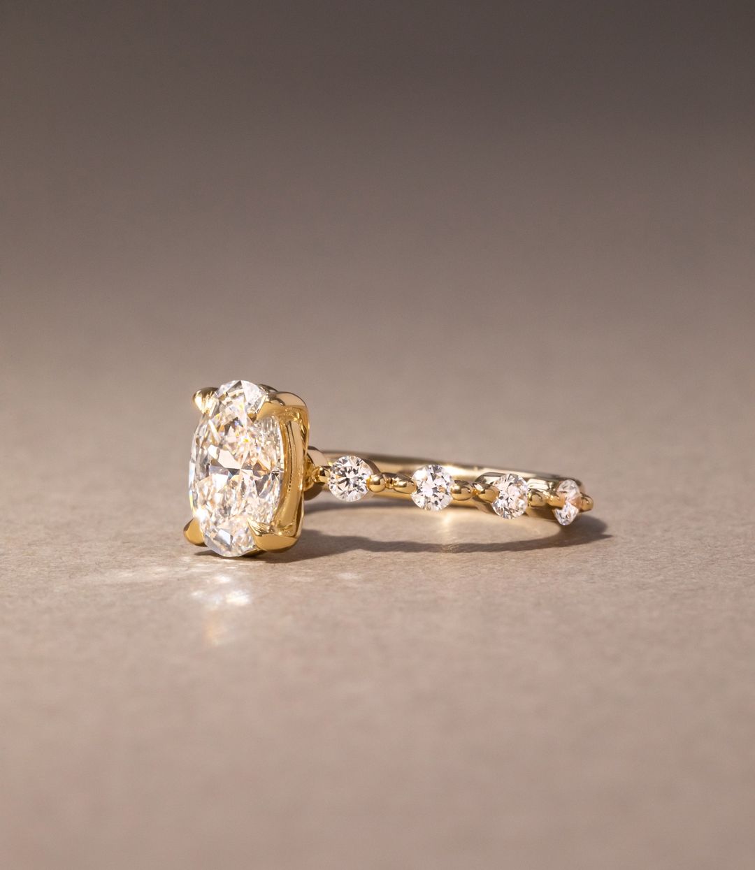 2.5ct Oval Cut Lab Grown Diamond With Veronica Setting Petite Claws Ring Designer gold ring set with high-quality diamonds, perfect for gifting.  Beautifully crafted diamond and gold ring, blending tradition with contemporary style. Diamond Ring Women Engagement Ring Finger For Her Finger Ring Gold Ring Bluestone Ring Diamond Ring Price Gold Ring Price