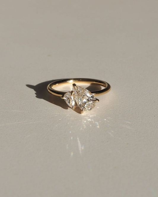 2.5tcw Duet Pear Toi Et Moi lab Grown Diamond Ring Close-up of an exquisite gold-band ring featuring a diamond, ideal for engagement celebrations or luxury jewelry enthusiasts. The soft manicure enhances the refined and elegant appeal. YouTube Amazon Facebook Weather Google Gmail Wordless WhatsApp Web Translate News blog post ring ceremony Article Life Money 2025 design Ring Ceremony Diamond Shape Diamond Ring Surat Diamond India Market Diamond Ring for Her Diamond Ring for Men Diamond Ring Women Engagement