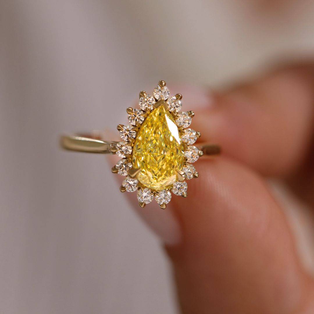 2ct Pear Cut Center stone with Princess cut Crown Lab Grown Diamond Ring  Luxury  diamond ring on a polished gold band natural manicure. Perfect for engagements, weddings, or anniversary gifts, this elegant jewelry piece embodies sophistication and timeless beauty.  YouTube Amazon Facebook Weather Google Gmail Wordless WhatsApp Web Translate News blog post ring ceremony Article Life Money 2025 design Ring Ceremony Diamond Shape Diamond Ring Surat Diamond India Market Diamond Ring for Her Diamond Ring for