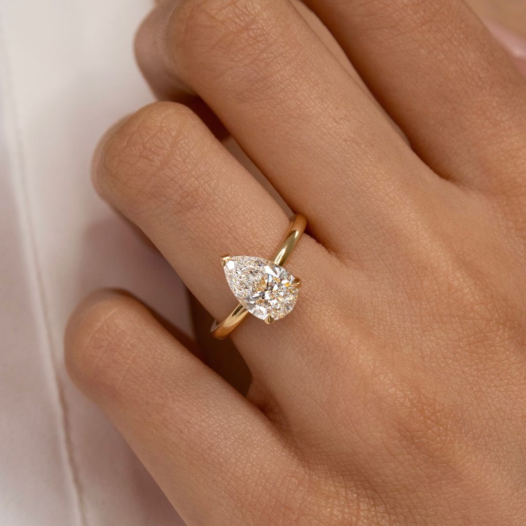 3.5ct Pear Cut Lab Grown Diamond With three Claw  Refined gold ring with diamonds, a luxurious accessory for every woman. Luxurious handcrafted diamond gold ring with a unique vintage-inspired design. YouTube Amazon Facebook Weather Google Gmail Wordless WhatsApp Web Translate News blog post ring ceremony Article Life Money 2025 design Ring Ceremony Diamond Shape Diamond Ring Surat Diamond India Market Diamond Ring for Her Diamond Ring for Men Diamond Ring Women Engagement Ring Finger For Her Finger Ring 