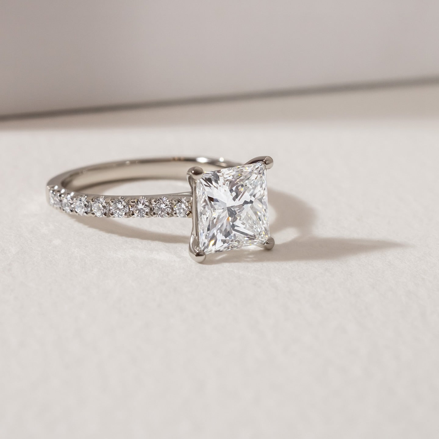 3ct Princess Cut Lab Grown Diamond With Diamond Pave Band  Its versatile design also makes it a stunning addition to any luxury jewelry collection, modern engagement rings, premium wedding bands, or high-end diamond rings. YouTube Amazon Facebook Weather Google Gmail Wordless WhatsApp Web Translate News blog post ring ceremony Article Life Money 2025 design Ring Ceremony Diamond Shape Diamond Ring Surat Diamond India Market Diamond Ring for Her Diamond Ring for Men Diamond Ring Women Engagement Ring Finger 