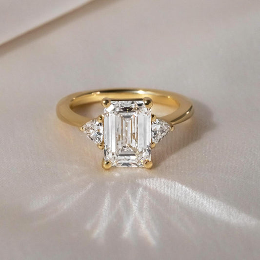 4.5ct Emerald Cut Three Stone Lab Grown Diamond Ring With Manilla Setting  it’s a versatile accessory for any special occasion or as part of a high-end jewelry collection for engagement proposals, high-end jewelry lovers, and wedding occasions. YouTube Amazon Facebook Weather Google Gmail Wordless WhatsApp Web Translate News blog post ring ceremony Article Life Money 2025 design Ring Ceremony Diamond Shape Diamond Ring Surat Diamond India Market Diamond Ring for Her Diamond Ring for Men Diamond Ring Women 