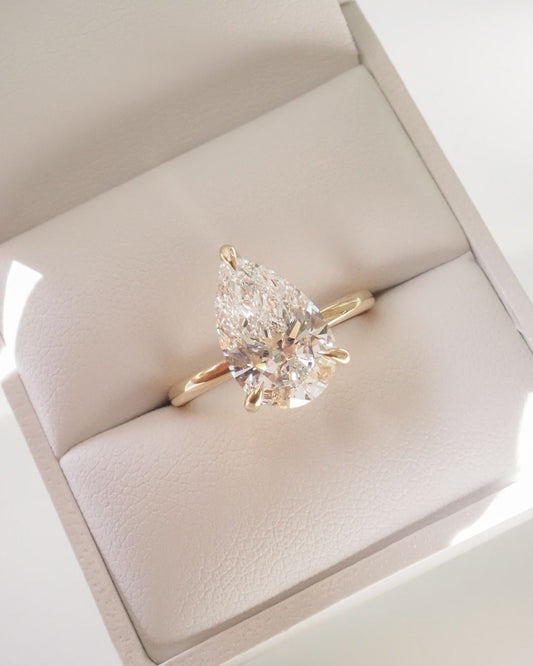 7ct Pear Cut Solitaire Lab Grown Diamond Ring Radiant gold ring with an oval-cut diamond centerpiece, exuding sophistication. Gold infinity ring adorned with shimmering diamonds, perfect for anniversaries or milestones. YouTube Amazon Facebook Weather Google Gmail Wordless WhatsApp Web Translate News blog post ring ceremony Article Life Money 2025 design Ring Ceremony Diamond Shape Diamond Ring Surat Diamond India Market Diamond Ring for Her Diamond Ring for Men Diamond Ring Women Engagement Ring Finger