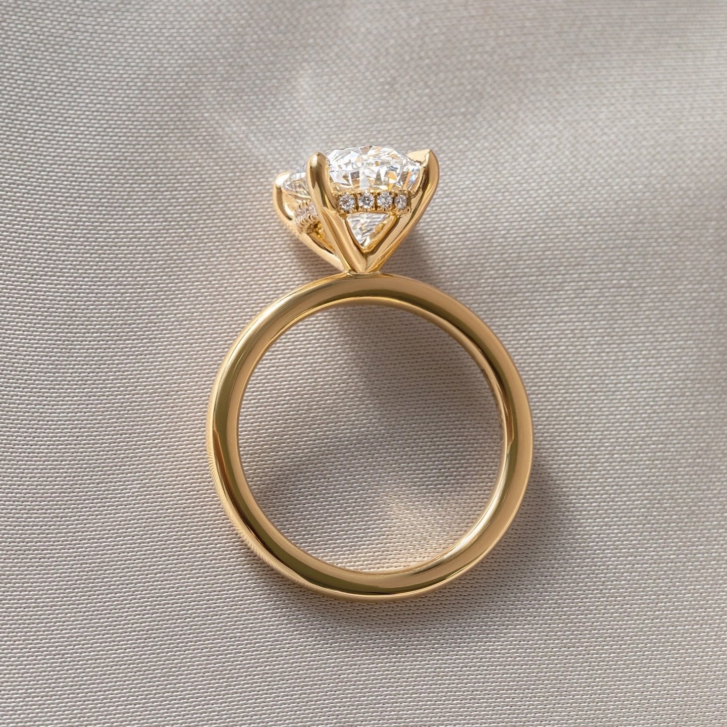 5ct Oval Cut Four Claw Lab Grown Diamond Ring Elegant close-up of a hand showcasing an engagement ring with a gold band, ideal for proposals, weddings, or luxury jewelry collections, paired with a soft, natural manicure. YouTube Amazon Facebook Weather Google Gmail Wordless WhatsApp Web Translate News blog post ring ceremony Article Life Money 2025 design Ring Ceremony Diamond Shape Diamond Ring Surat Diamond India Market Diamond Ring for Her Diamond Ring for Men Diamond Ring Women Engagement Ring Finger 