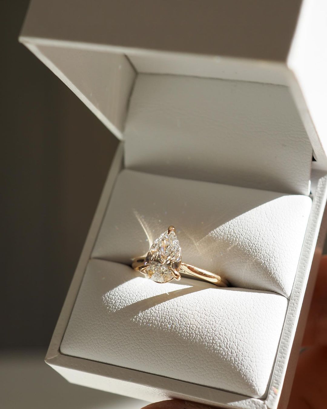 4ct Pear Cut Three Claw Lab Grown Diamond Solitaire Ring diamond engagement ring with a sleek gold band, featured on a hand with a minimalist manicure. Ideal for bridal jewelry collections, luxury fashion, or romantic proposal moments. YouTube Amazon Facebook Weather Google Gmail Wordless WhatsApp Web Translate News blog post ring ceremony Article Life Money 2025 design Ring Ceremony Diamond Shape Diamond Ring Surat Diamond India Market Diamond Ring for Her Diamond Ring for Men Diamond Ring Women Engagement