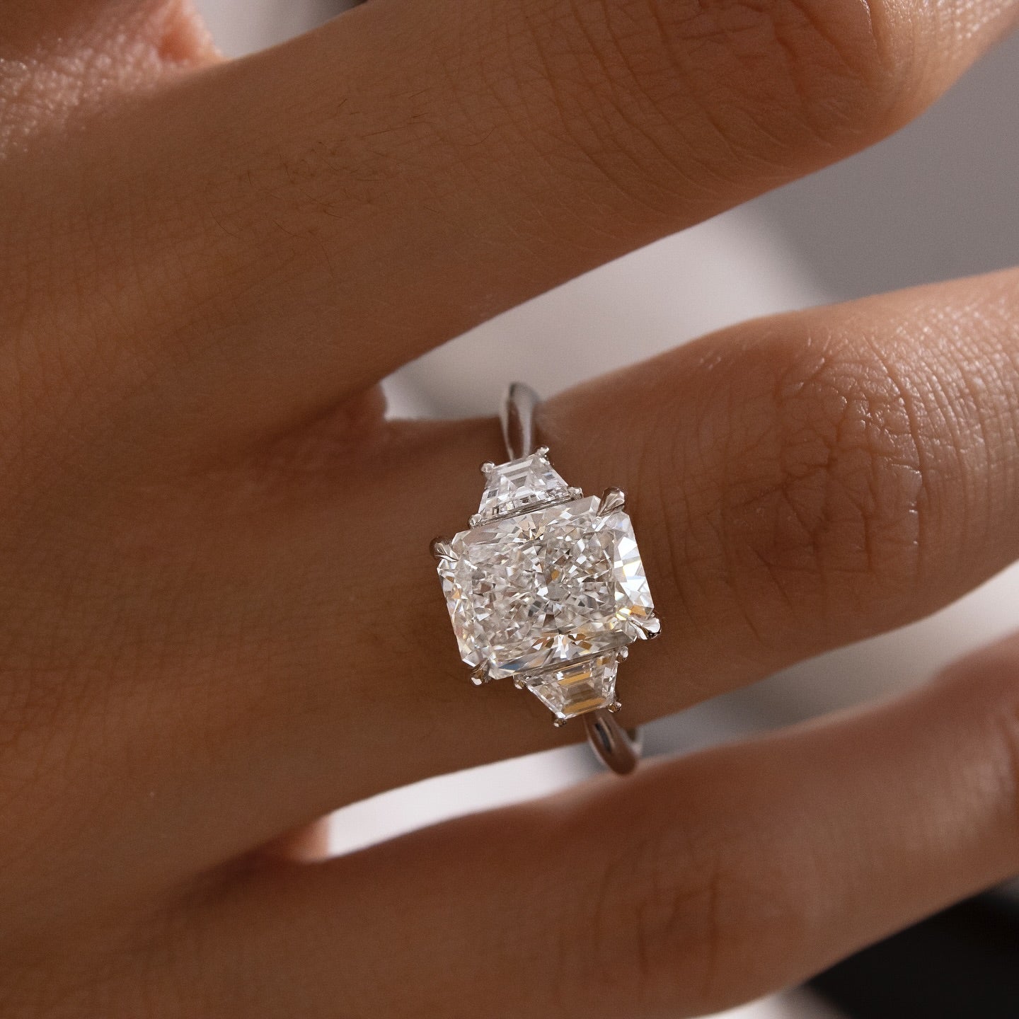 4ct Radiant Cut Lab Grown Diamond With Kite Side Stone  Brides and grooms alike can celebrate their love story with this sophisticated engagement ring, diamond ring, gold engagement ring, luxury bridal jewelry, wedding accessories YouTube Amazon Facebook Weather Google Gmail Wordless WhatsApp Web Translate News blog post ring ceremony Article Life Money 2025 design Ring Ceremony Diamond Shape Diamond Ring Surat Diamond India Market Diamond Ring for Her Diamond Ring for Men Diamond Ring Women Engagement Ring