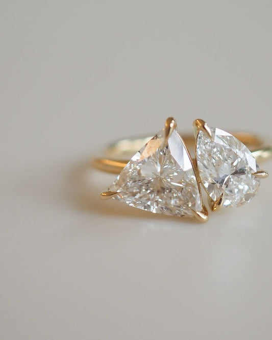 3tcw Pear & Trillion Cut Toi Et Moi Lab Grown Diamond Ring Luxury  diamond ring on a polished gold band natural manicure. Perfect for engagements, weddings, or anniversary gifts, this elegant jewelry piece embodies sophistication and timeless beauty. YouTube Amazon Facebook Weather Google Gmail Wordless WhatsApp Web Translate News blog post ring ceremony Article Life Money 2025 design Ring Ceremony Diamond Shape Diamond Ring Surat Diamond India Market Diamond Ring for Her Diamond Ring for Men Diamond Ring 
