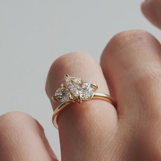 3tcw Duet Pear Cut Toi Et Moi Lab Grown Diamond Ring  Radiant gold ring with an oval-cut diamond centerpiece, exuding sophistication. Gold infinity ring adorned with shimmering diamonds, perfect for anniversaries or milestones. YouTube Amazon Facebook Weather Google Gmail Wordless WhatsApp Web Translate News blog post ring ceremony Article Life Money 2025 design Ring Ceremony Diamond Shape Diamond Ring Surat Diamond India Market Diamond Ring for Her Diamond Ring for Men Diamond Ring Women Engagement Ring 