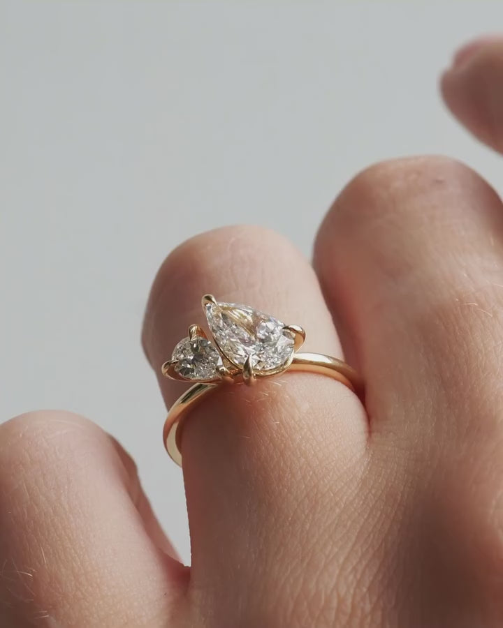3tcw Duet Pear Cut Toi Et Moi Lab Grown Diamond Ring  Radiant gold ring with an oval-cut diamond centerpiece, exuding sophistication. Gold infinity ring adorned with shimmering diamonds, perfect for anniversaries or milestones. YouTube Amazon Facebook Weather Google Gmail Wordless WhatsApp Web Translate News blog post ring ceremony Article Life Money 2025 design Ring Ceremony Diamond Shape Diamond Ring Surat Diamond India Market Diamond Ring for Her Diamond Ring for Men Diamond Ring Women Engagement Ring 